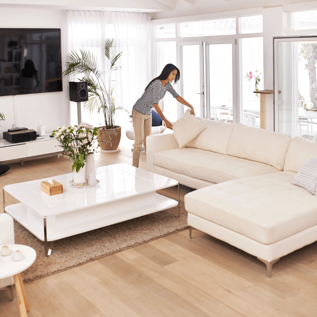 woman decorating minimalist living room