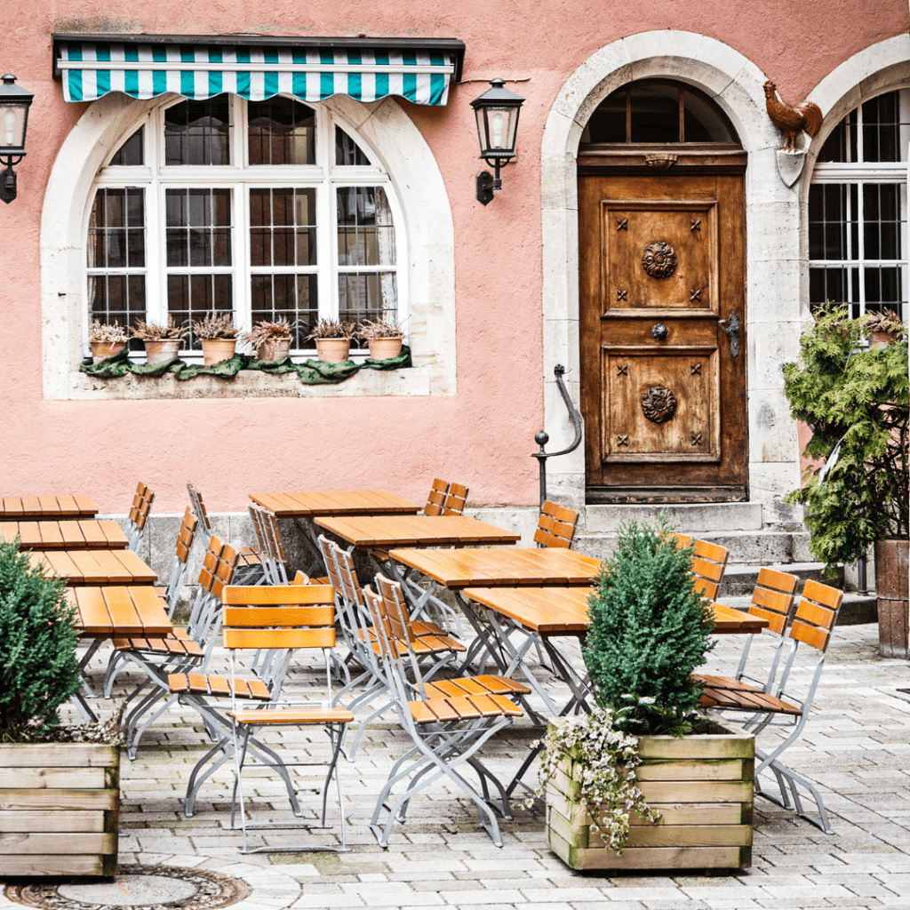 pink coffee shop with outdoor seating